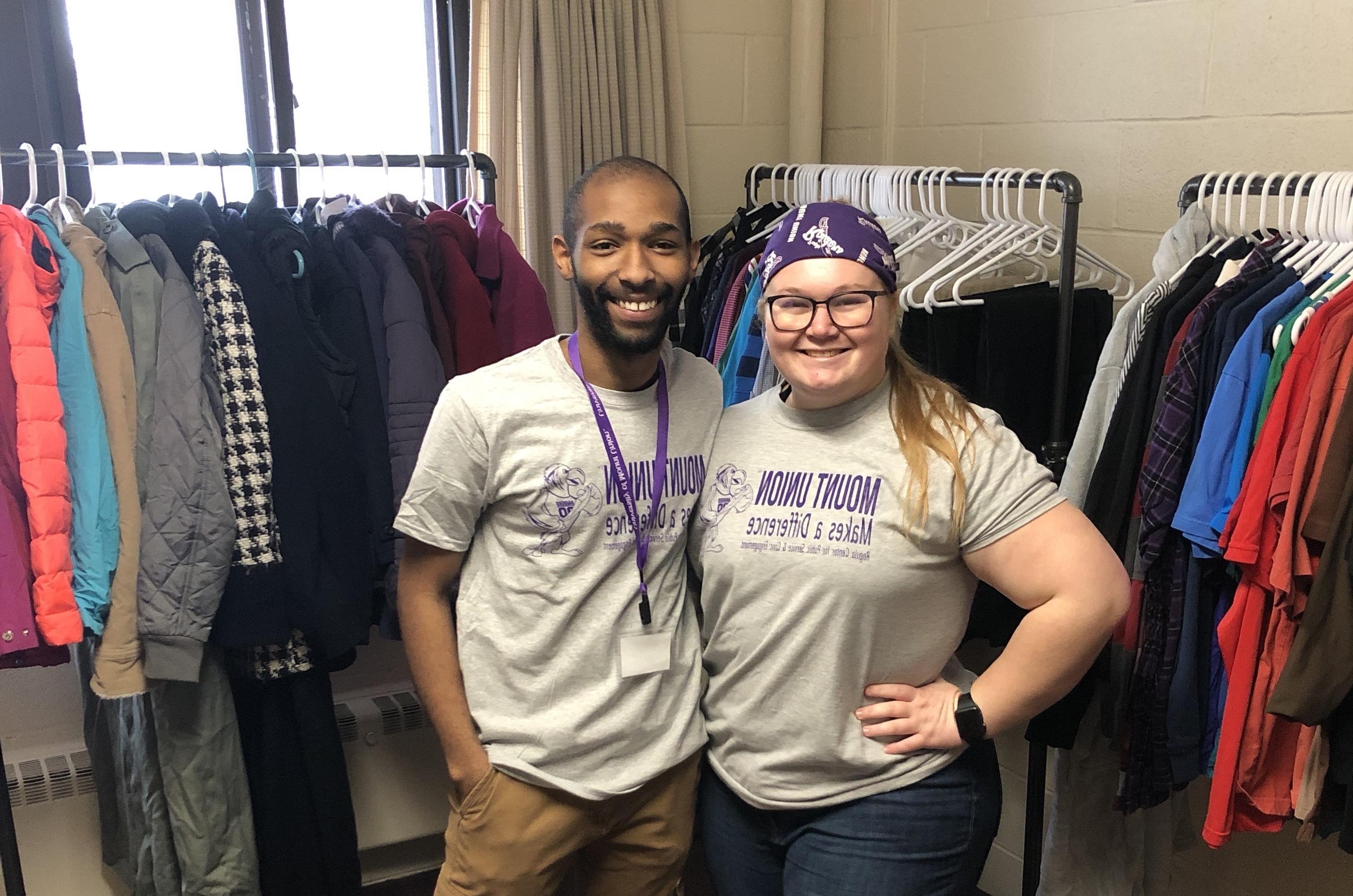 Students in front of clothes pantry